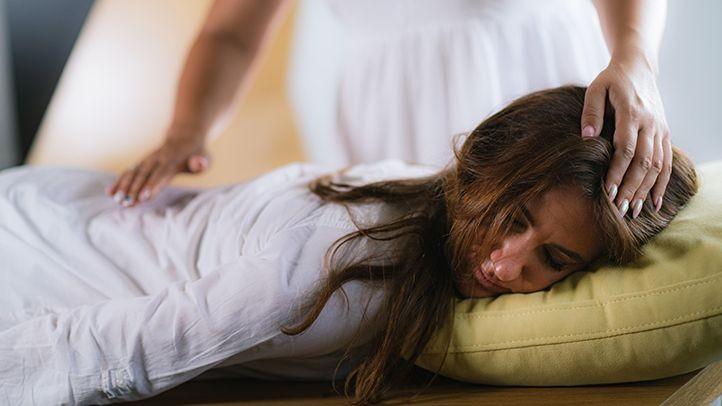 Here Is What You Need to Know About Reiki for Back Pain